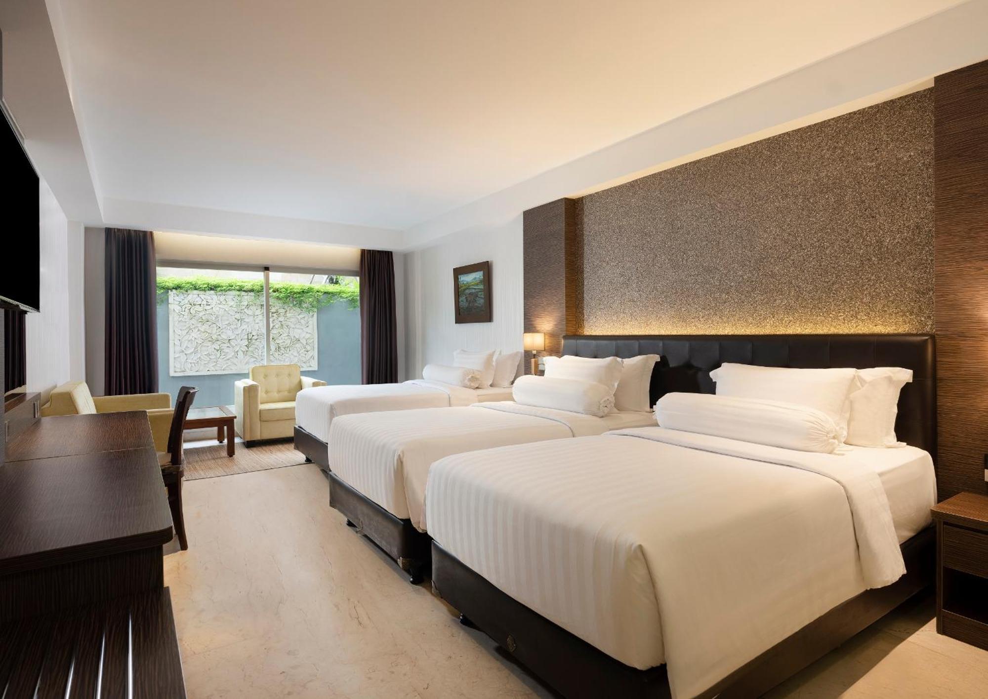 Deluxe Family King Room, with FREE daily shuttle to Ubud City, FREE Photo Session, FREE Art Gallery Visit, 24-hour access to Fitness Center, FREE Welcome Drink, and FREE Kids Activities.