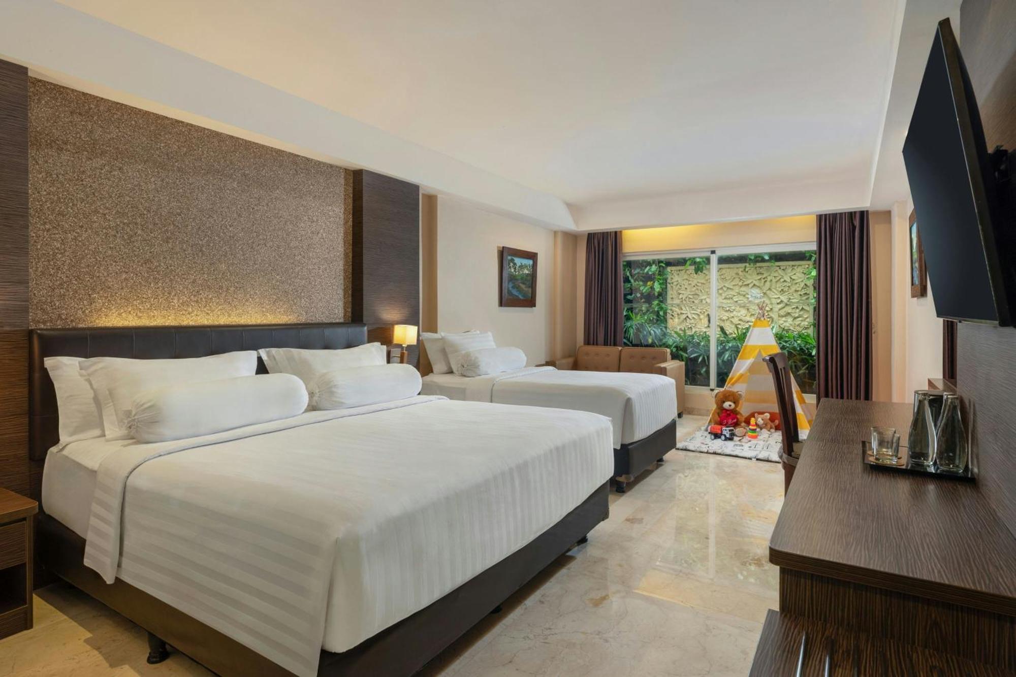 Deluxe Family King Room daily shuttle to Ubud City Photo Session Art Gallery Visit 24-hour access to Fitness Center Welcome Drink Kids Activities
